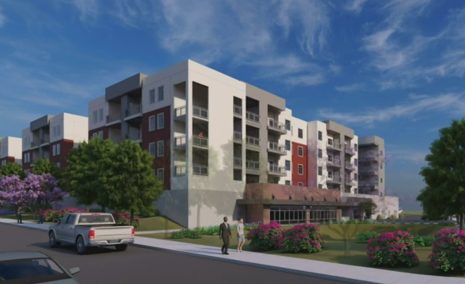 A rendering of the exterior of an apartment complex.