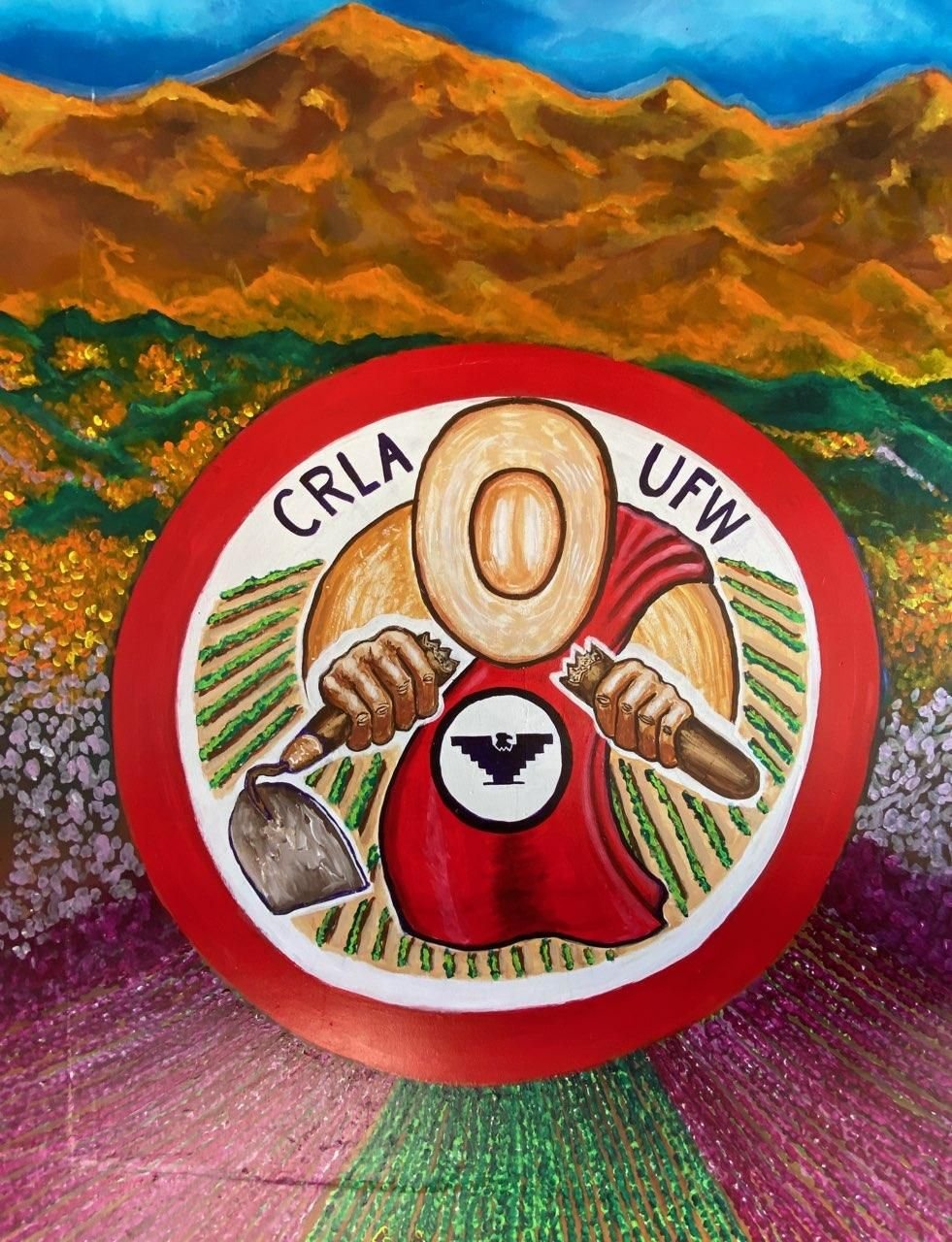 A painting of a red and white circle with a bird on it.