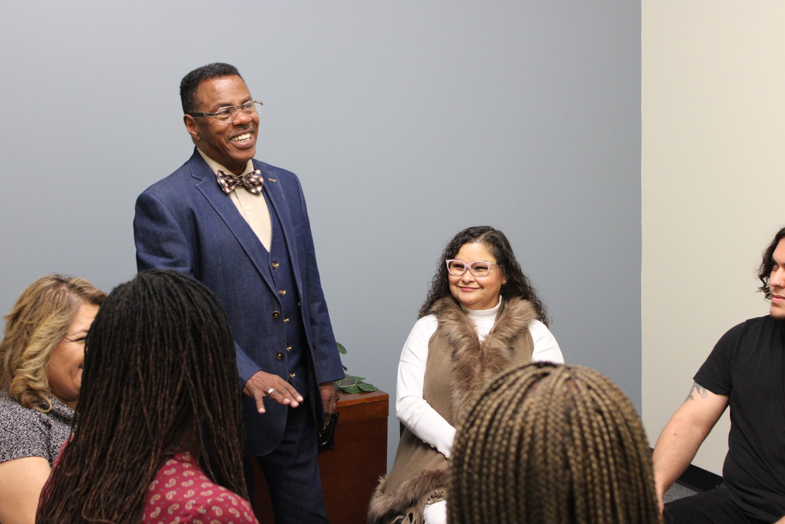 DUI program discussion A man and woman are talking to some people.