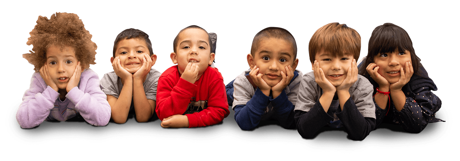 kids A group of young boys laying on the ground.