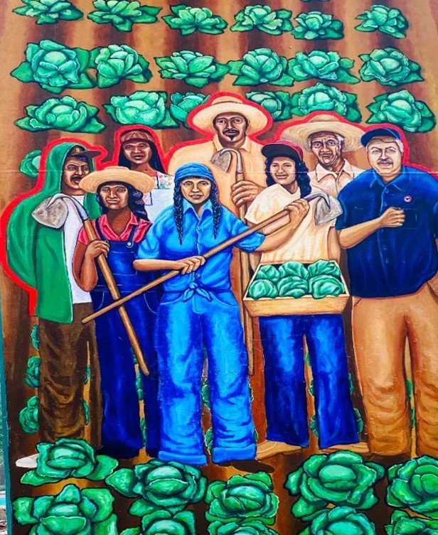 A painting of people in hats and holding weapons.